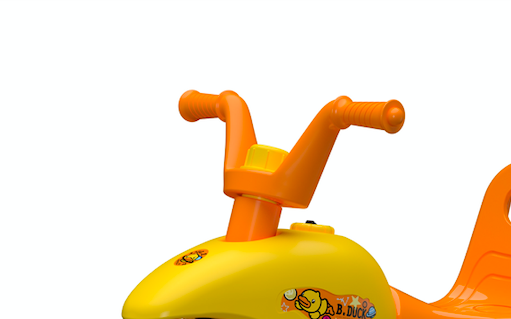 close up view of yellow ride on car handle