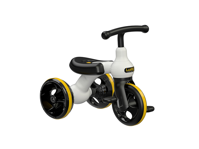 side view of black and white kids tricycle