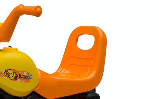 close up view of yellow ride on car seat