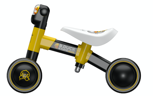 close up view of black and yellow kids tricycle body