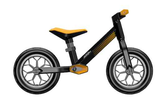 side view of black and yellow balance bike