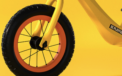 close up of balance bike wheel