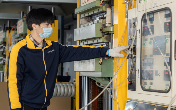 experienced workers configuring the production line