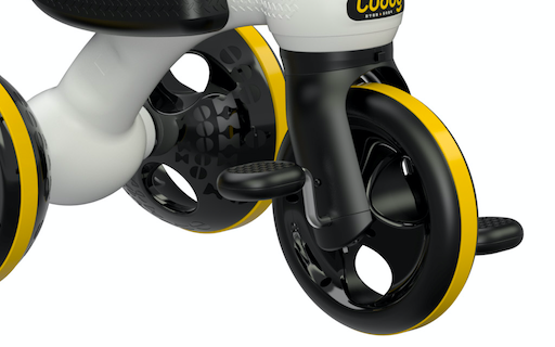close up of a ride on toys front wheel with pedals attached