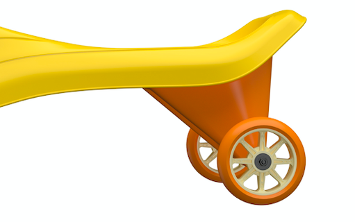 close up side view of yellow wiggle cars rear wheels