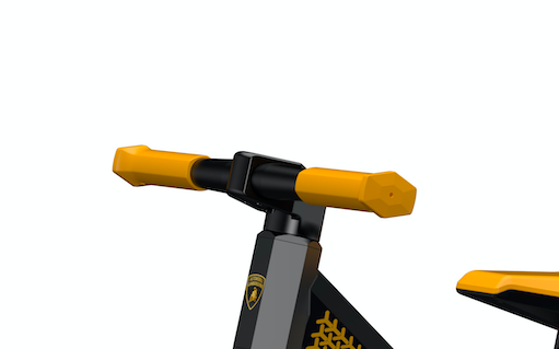 close up view of black and yellow balance bike handle