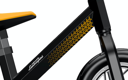 close up view of black and yellow balance bike stem