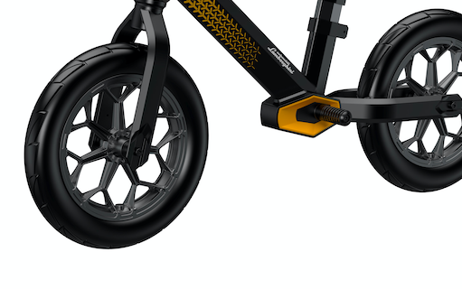 close up view of black and yellow balance bike bottom